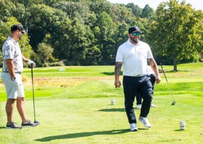 Golfers participating in fundraising event