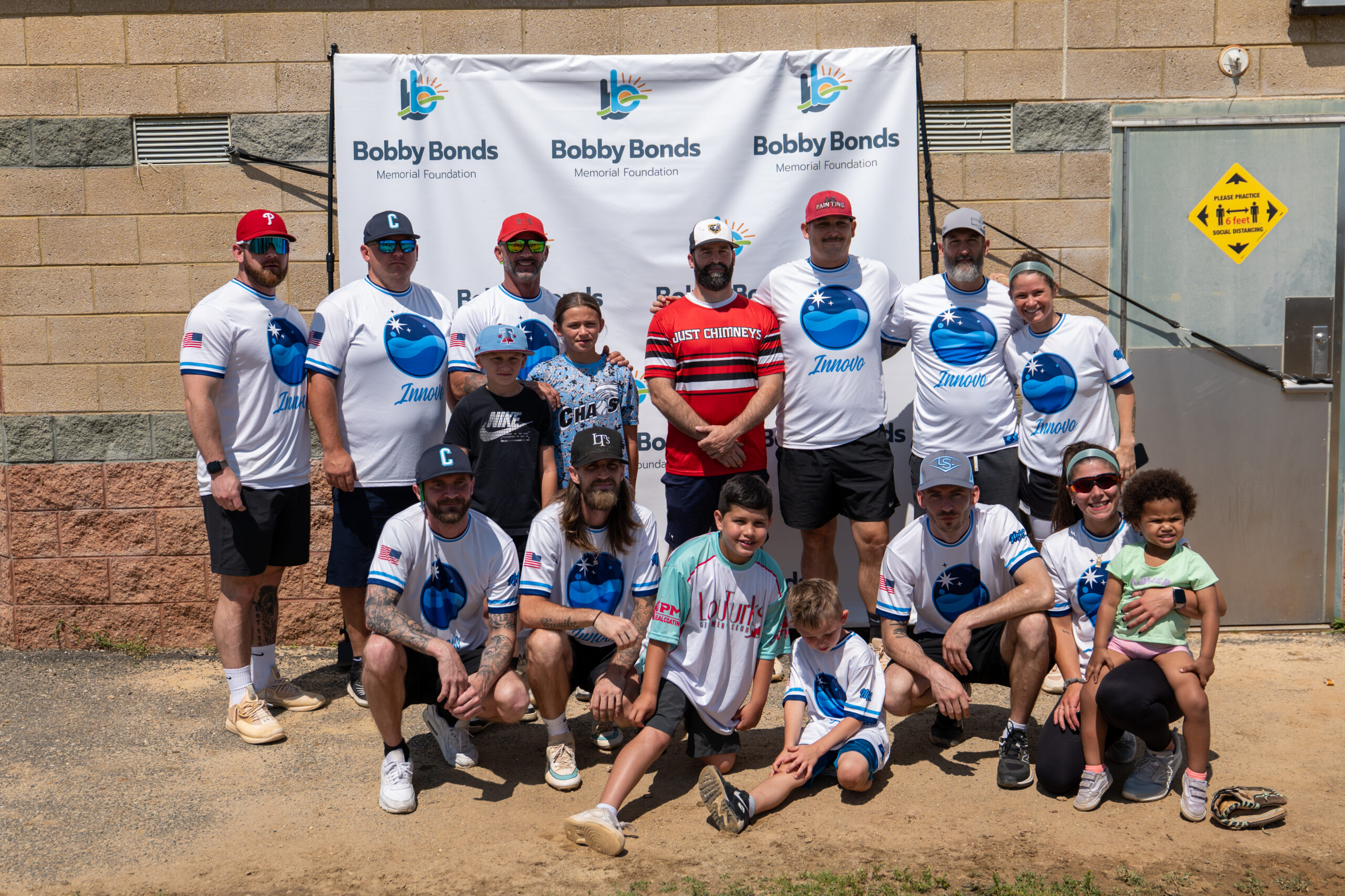 Softball team with children, coaches and parents